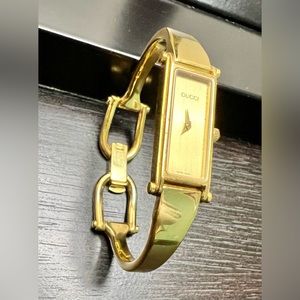 GUCCI 1500L Gold Bangle Ladies's Watch SWISS Made. AUTHENTIC